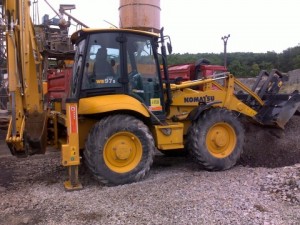 Komatsu - traktor báger